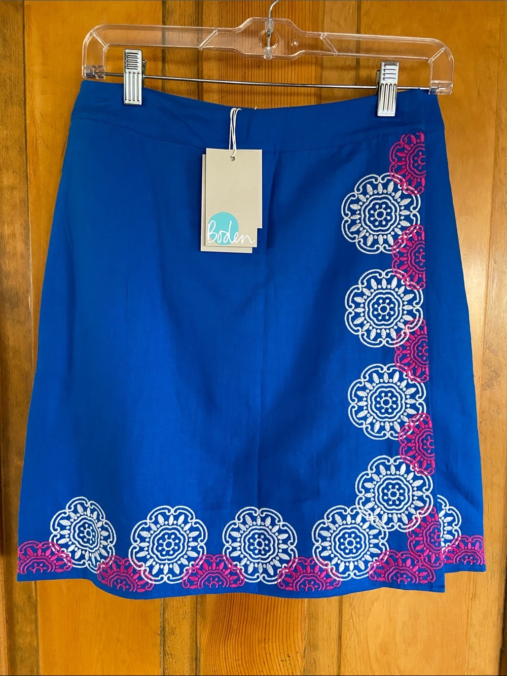 Boden cobalt blue A-line skirt with white & pink embroidery